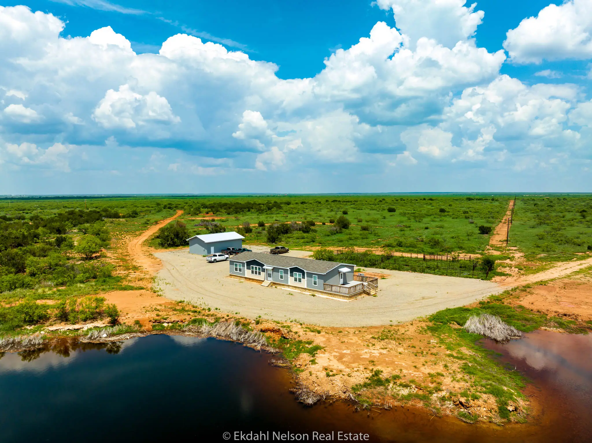 Aerial image of ranch home on expansive property to convey Aspermont Homes for Sale